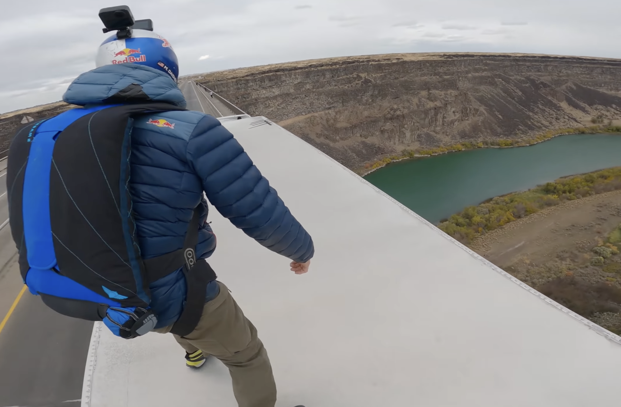 Watch these basejumpers leap from a moving semi truck