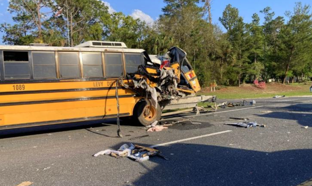 Five students injured after semi smashes into back of stopped bus