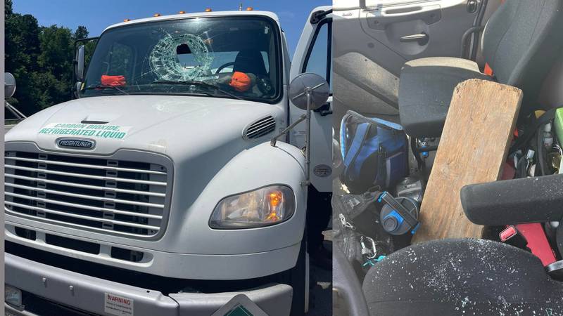 Plank flies off semi truck, smashes into driver of box truck