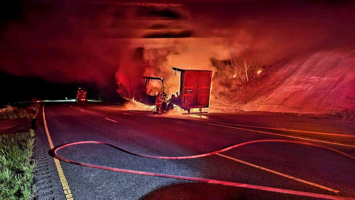 Truck catches fire as driver inspects damage from road debris 