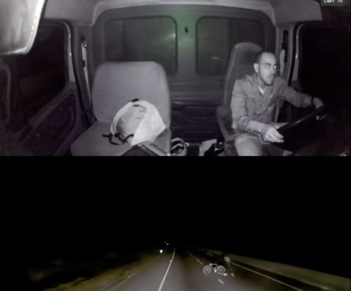 VIDEO: Guy rolls a bike right into the path of a big rig