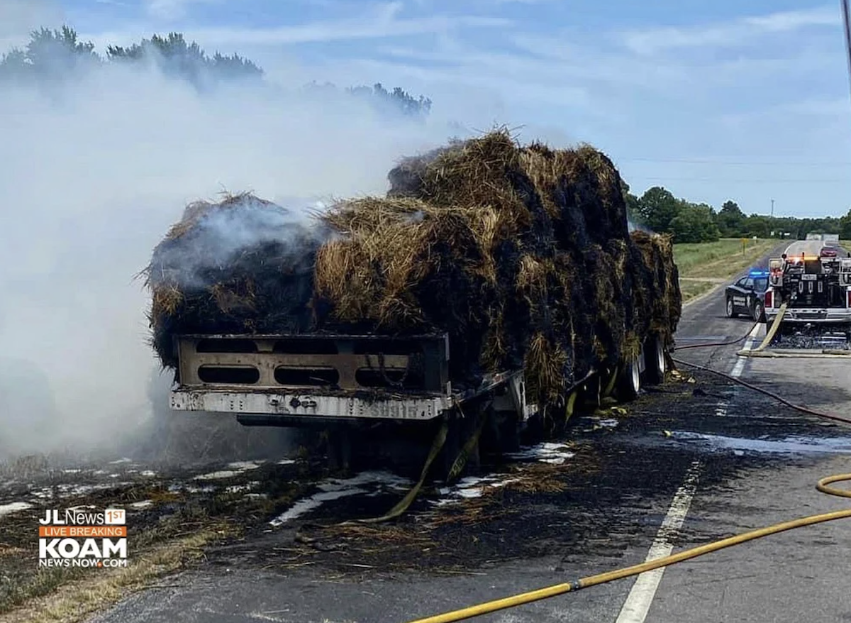 Four-wheeler’s tossed cigarette catches load of hay on fire