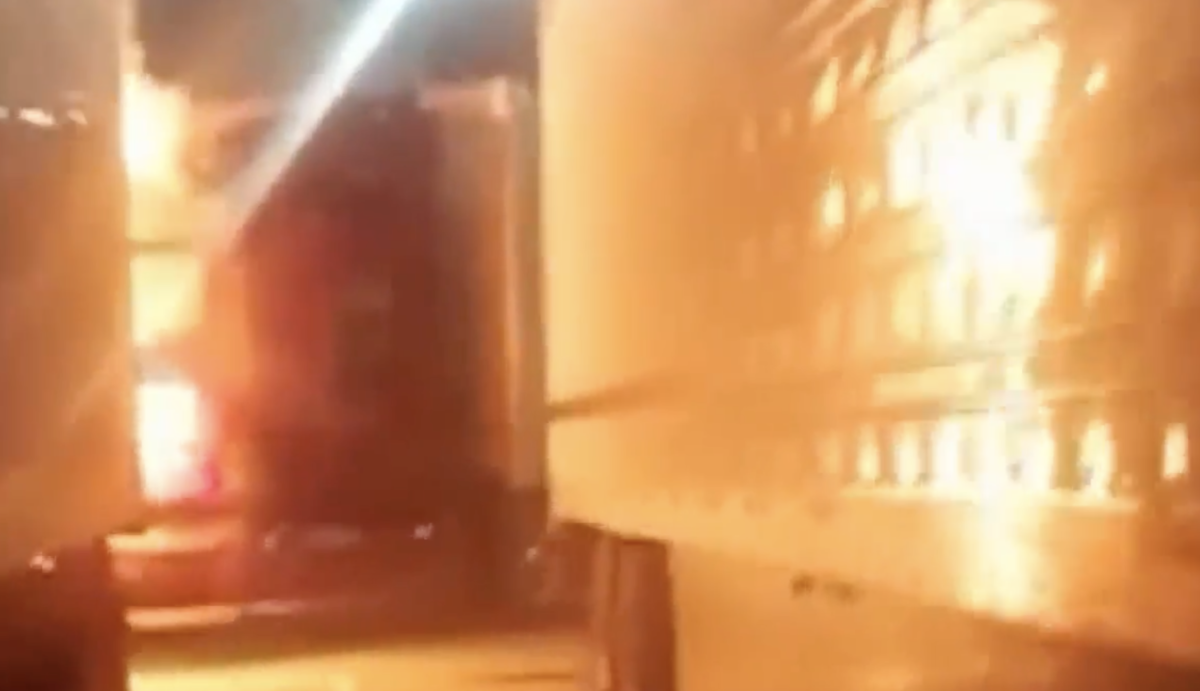 VIDEO: Trucker goes door-to-door warning drivers of nearby fire 