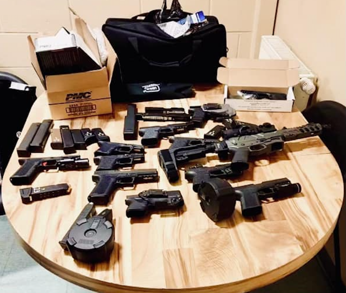 Troopers catch DUI motorist at weigh station with eight guns and a backpack full of drugs