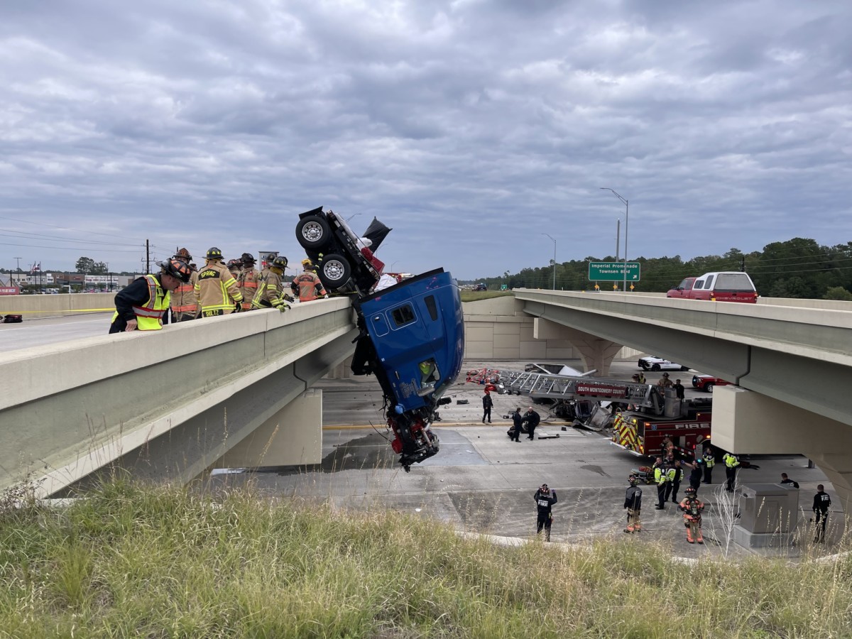 Crash Leaves Semi Dangling From Overpass In Texas