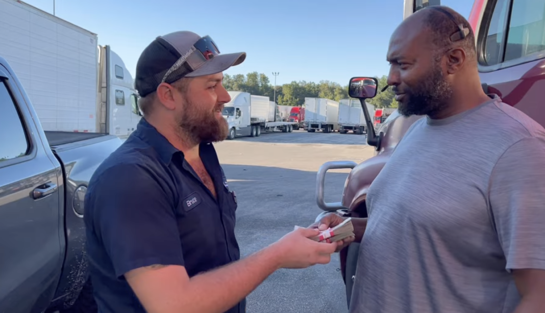WATCH Fellow driver passes out fuel money to unsuspecting truckers