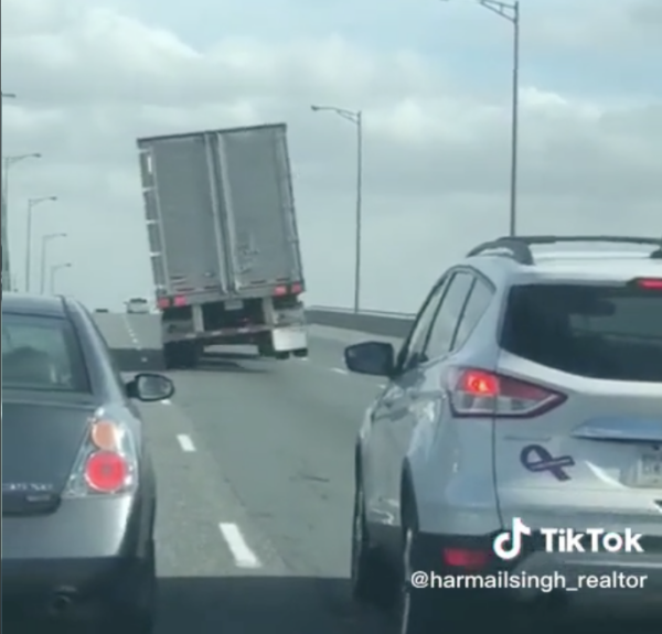 Video High Winds Batter Big Rig On Bridge