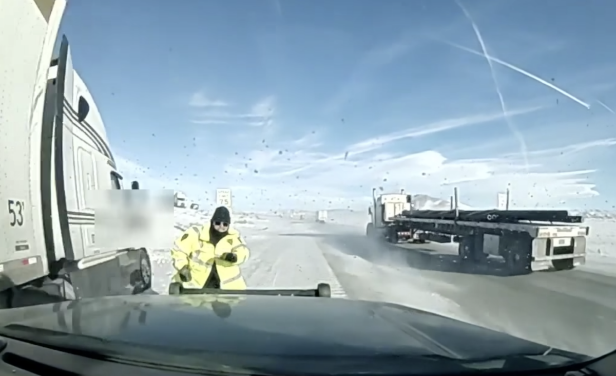 WATCH: Trooper skitters away as out-of-control semi truck nearly rolls over him 