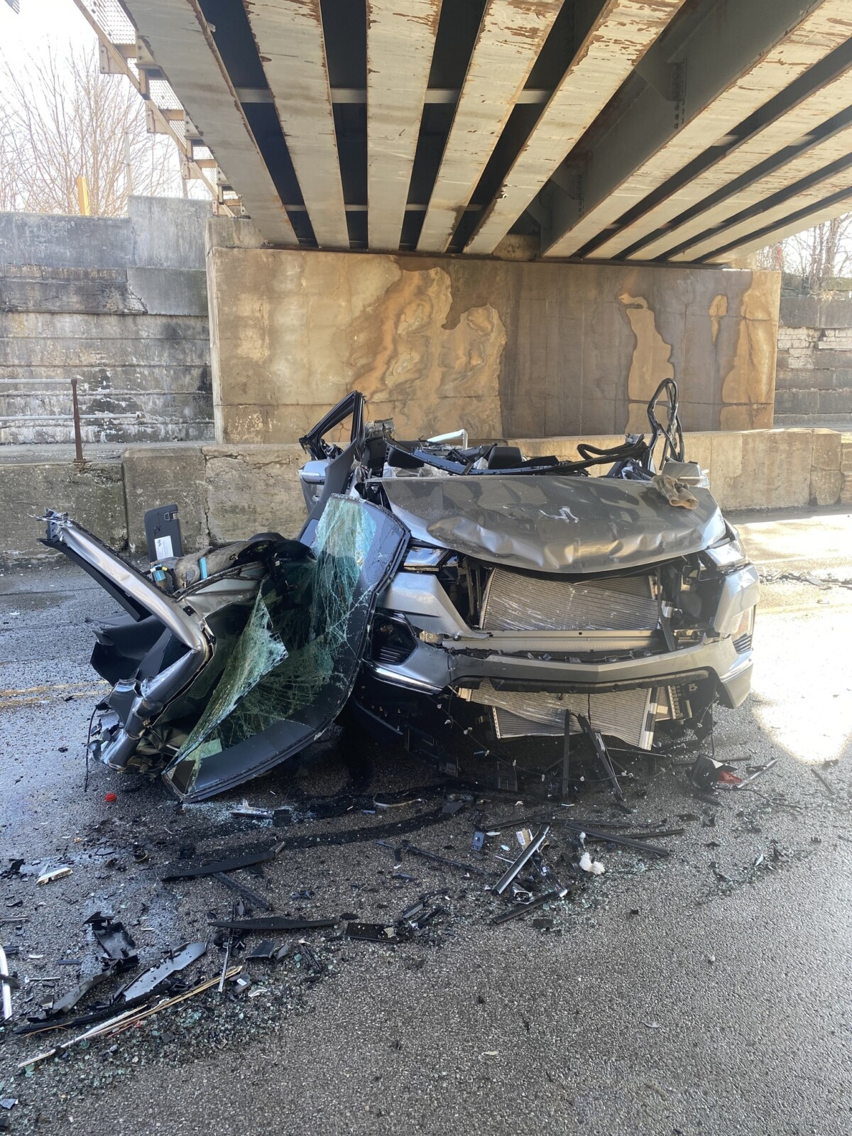 Multiple vehicles damaged after car hauler crashes into viaduct in Ohio ...