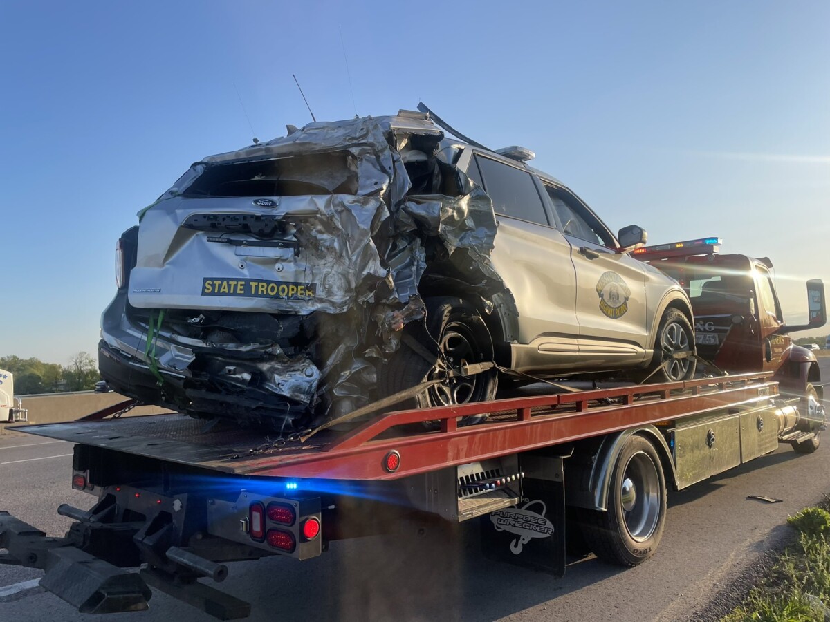 Big rig hits three parked police vehicles on I-44, leaving three officers injured