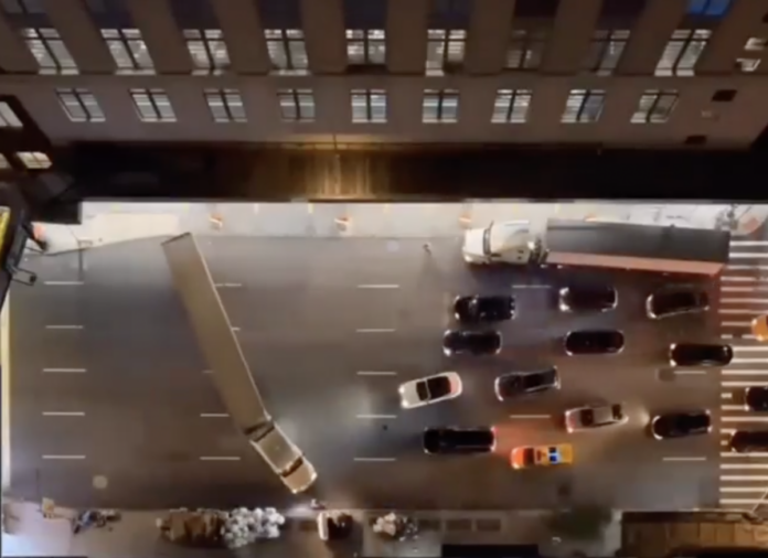 This video of trucks backing into a dock amid New York City