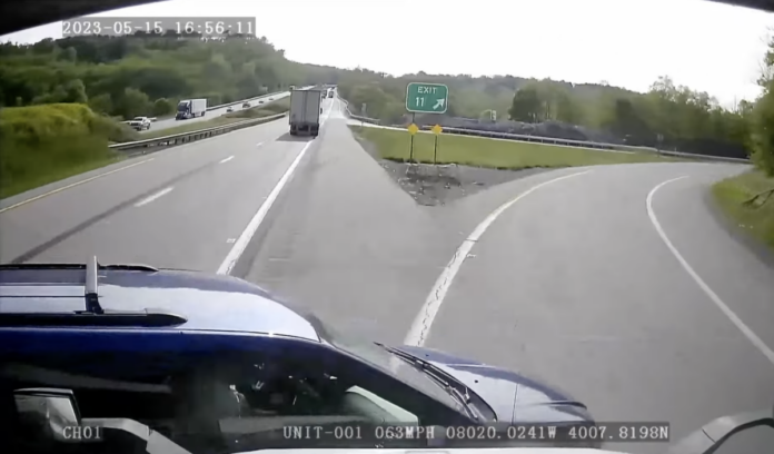 Dash cam shows car pull in front of semi-truck