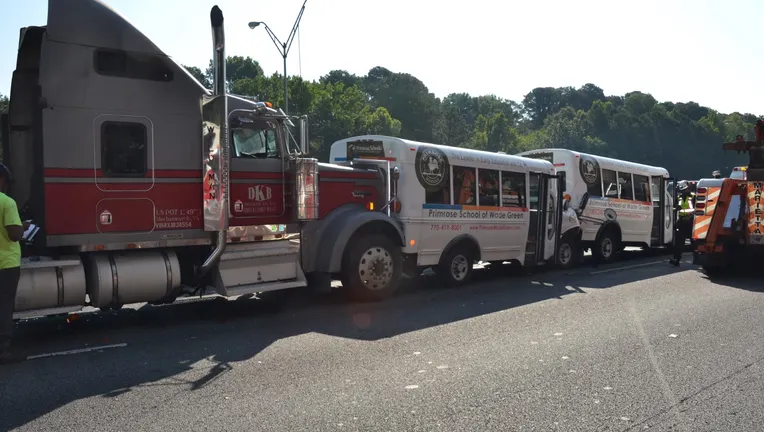 Six hurt in 5 vehicle crash involving two loaded daycare buses in Georgia