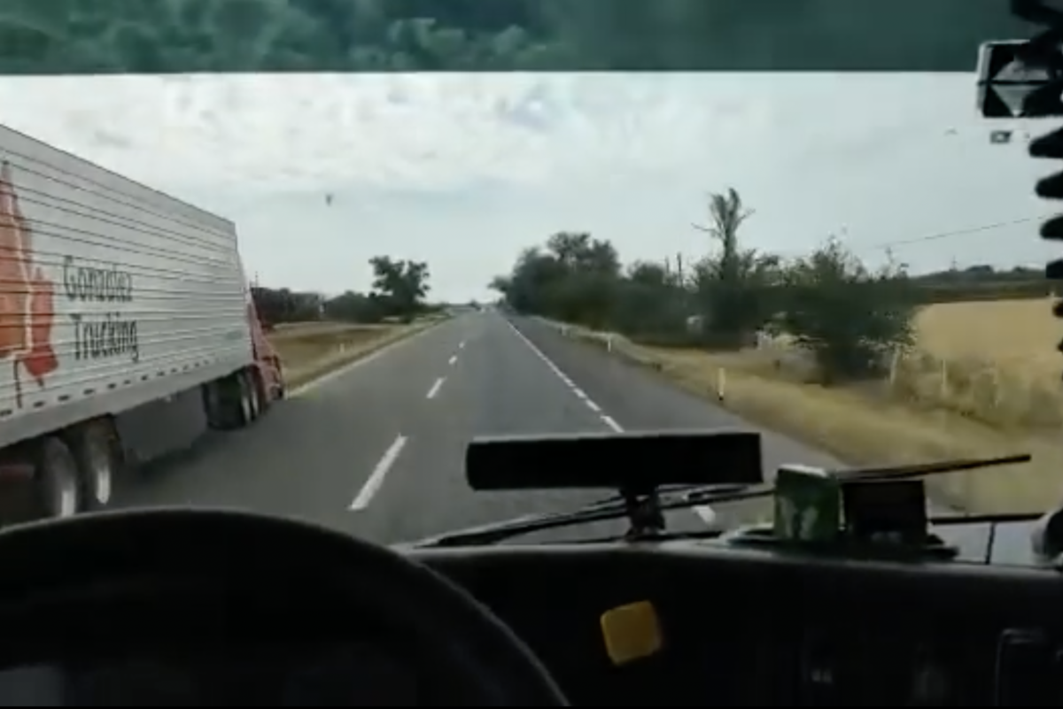 VIDEO: Big rig driver takes a WTF shortcut through the median