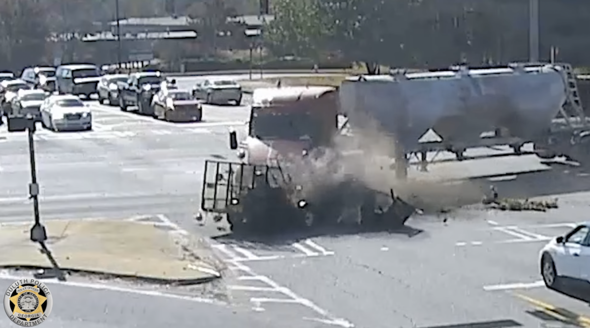 VIDEO: Georgia cops cited turning trucker for crash with pickup with trailer