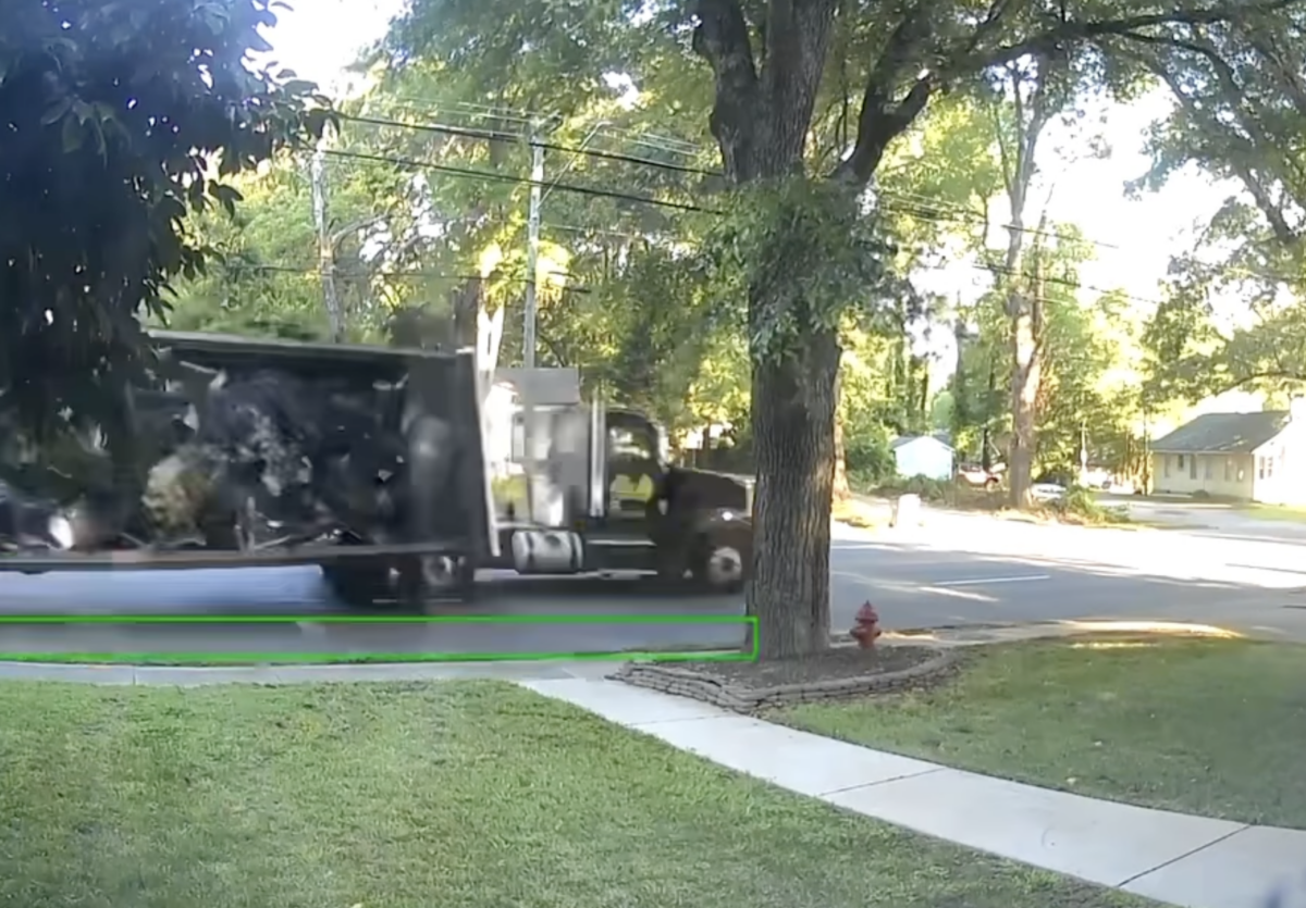 Watch the moment a scrap metal truck sends it WAY too hard 