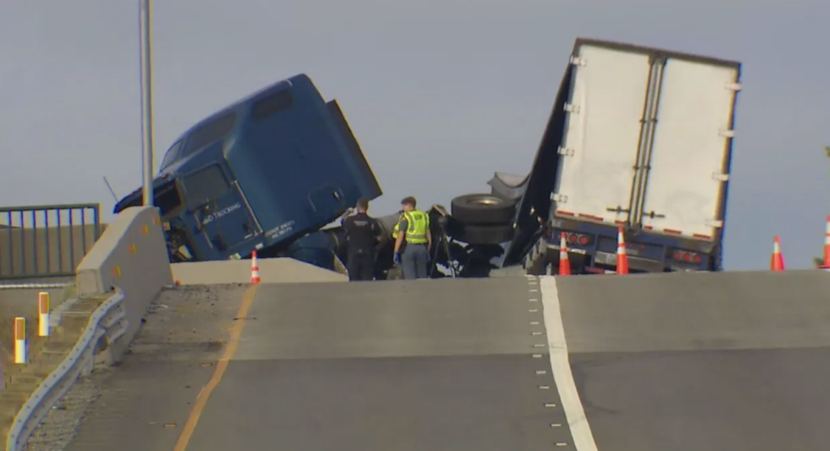 Trucker flung off of interstate in wreck with armed robber fleeing police 