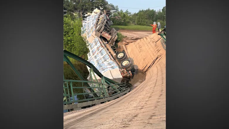 Rural bridge collapses after big rig drives over, police say