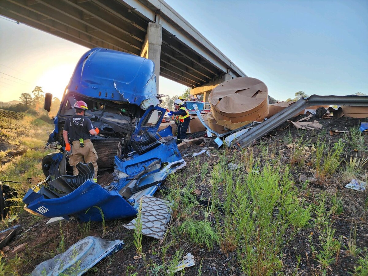 Semi truck veers off Arizona interstate, plummets 30 feet to road below