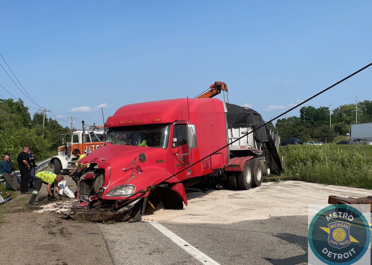 Trucker ticketed after rear-ending two vehicles, striking illegally parked tow truck, Michigan troopers say