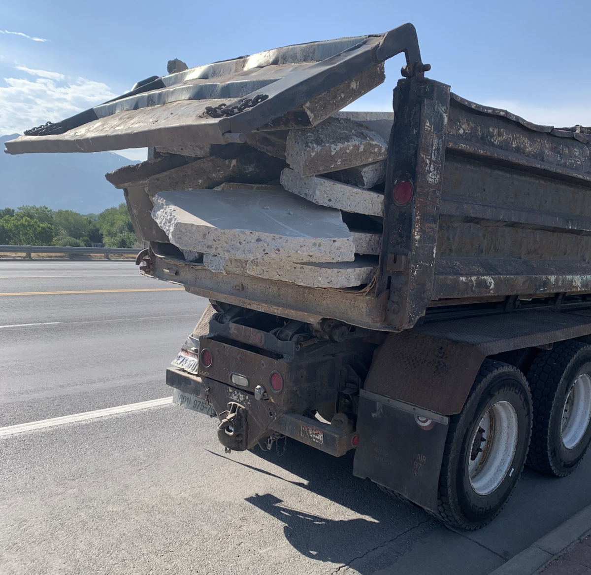 Dump truck driver sidelined for unsafe concrete slab haul