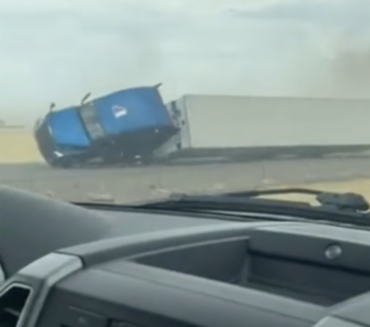 VIDEO: Semi truck blown over by microburst in Utah