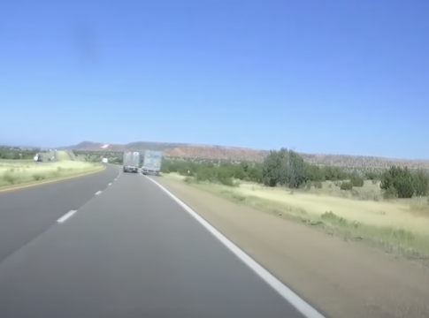 Dash cam catches big rig overturning after being run off the road by ...