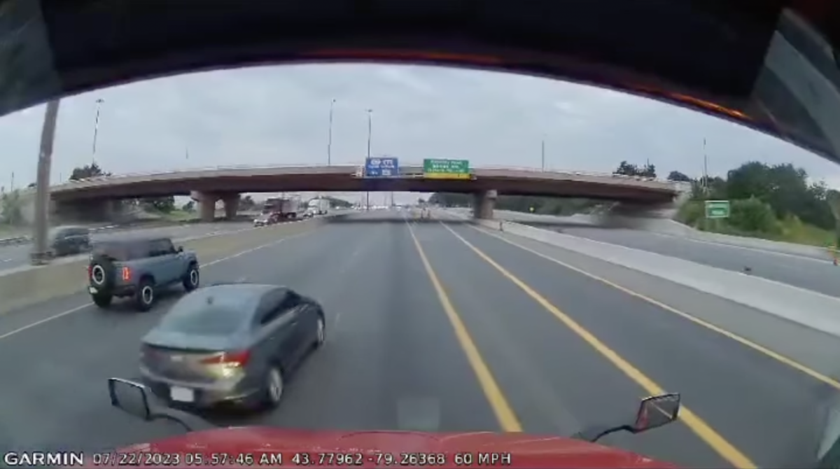 VIDEO: Karma comes for speeding car driver who passed semi unsafely