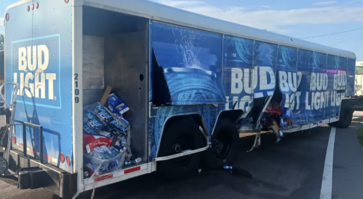 Cans scattered through intersection after motorist slams into beer truck 