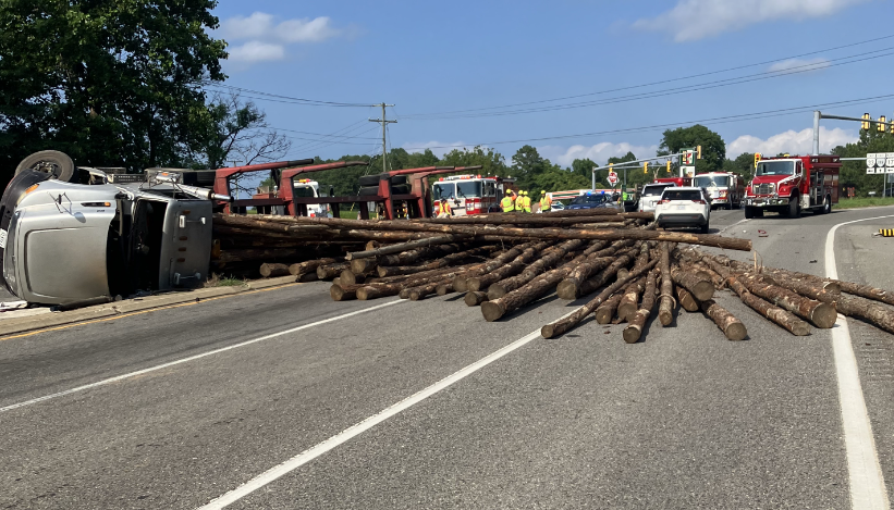 POLICE: Five cars collide with loose logs after trucker’s ‘reckless driving’