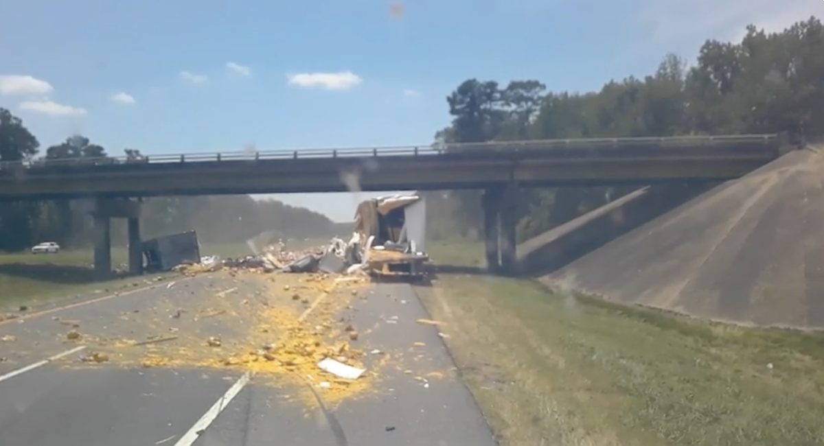 VIDEO: Semi swerves, splits open trailer loaded with nacho cheese on Arkansas interstate