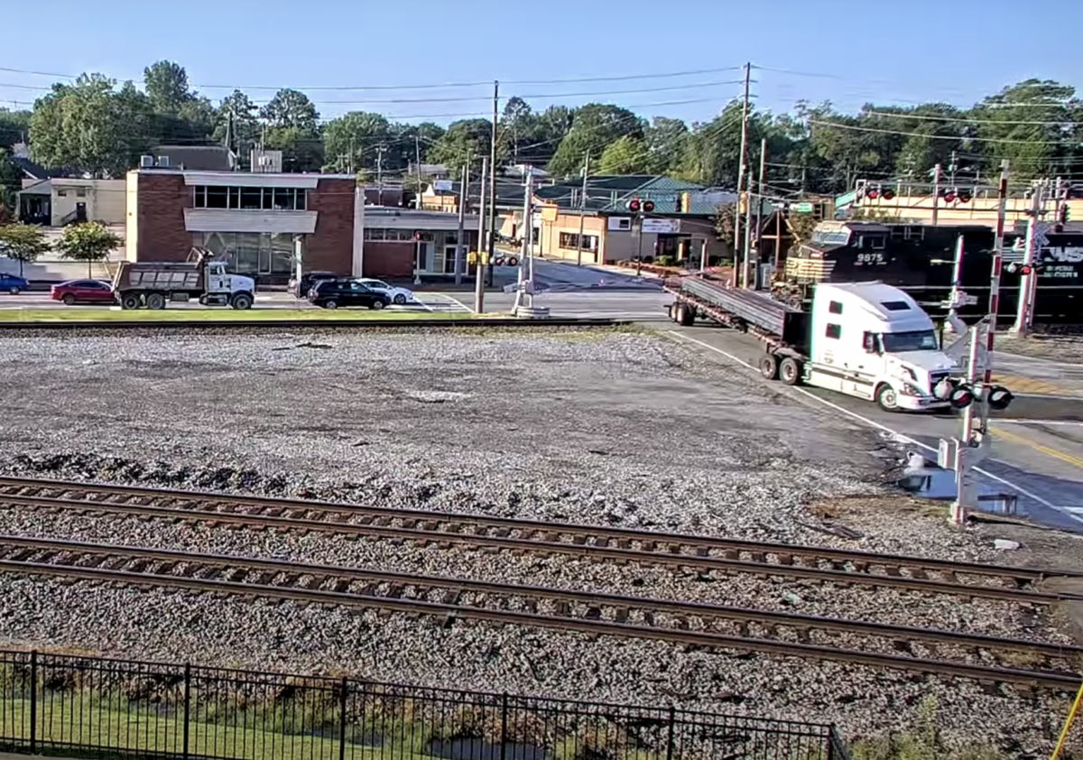 VIDEO: Semi doesn’t clear tracks fast enough, gets trailer smacked by freight train