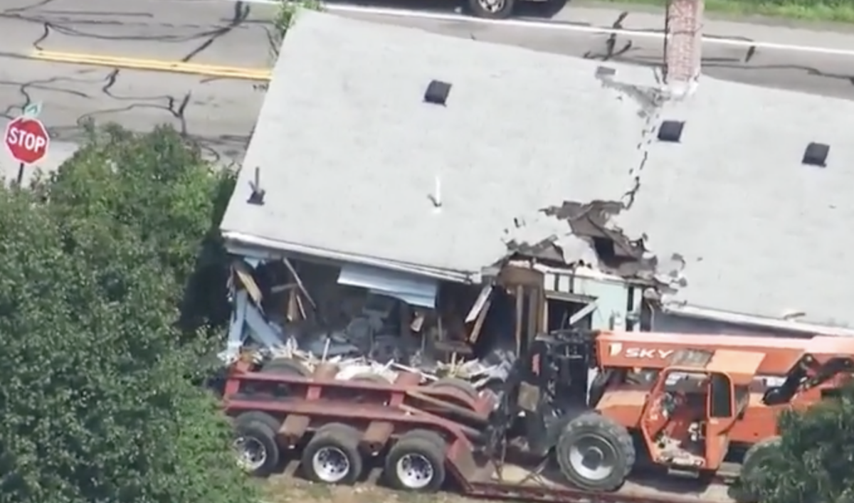 Truck “literally” crashes through yard and into elderly woman’s house 