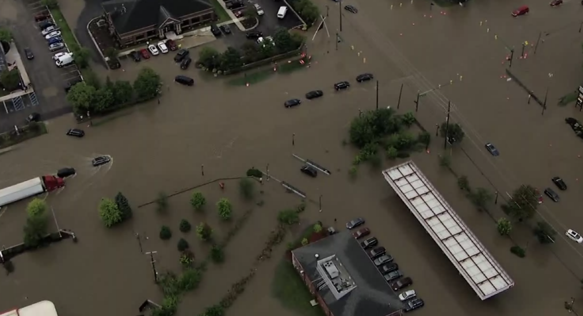 These roadways in Detroit are closed for flooding so severe that cars are completely submerged