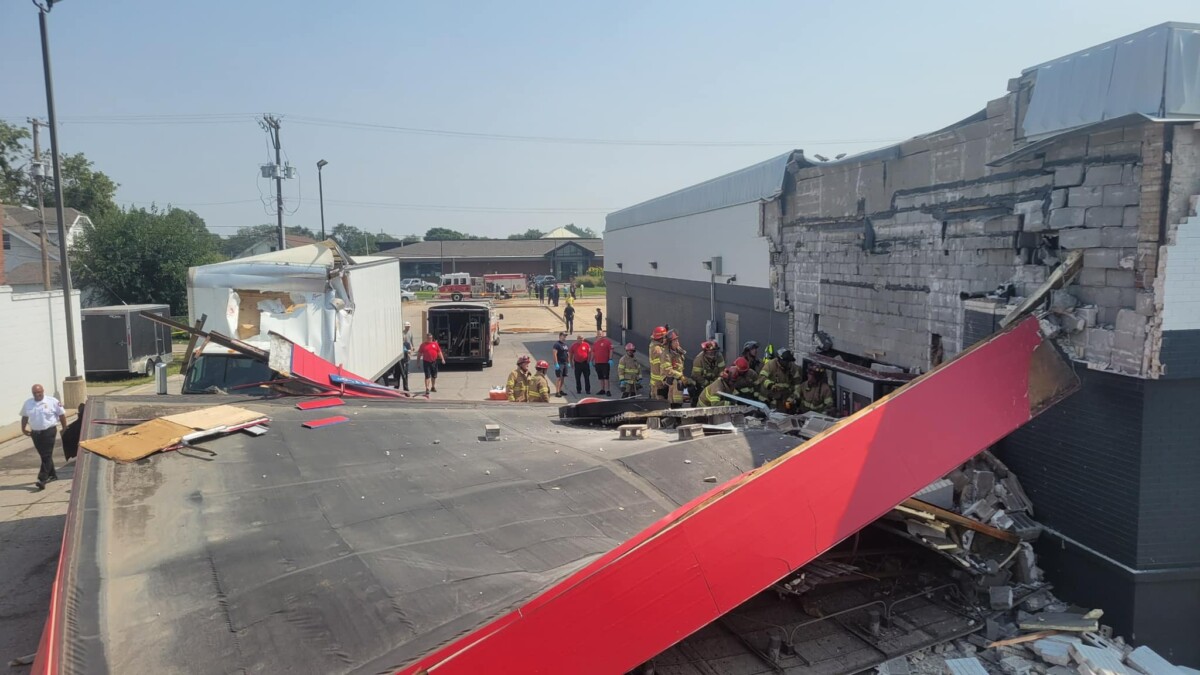 Box truck reportedly strikes drive-thru awning, causes it to collapse on car