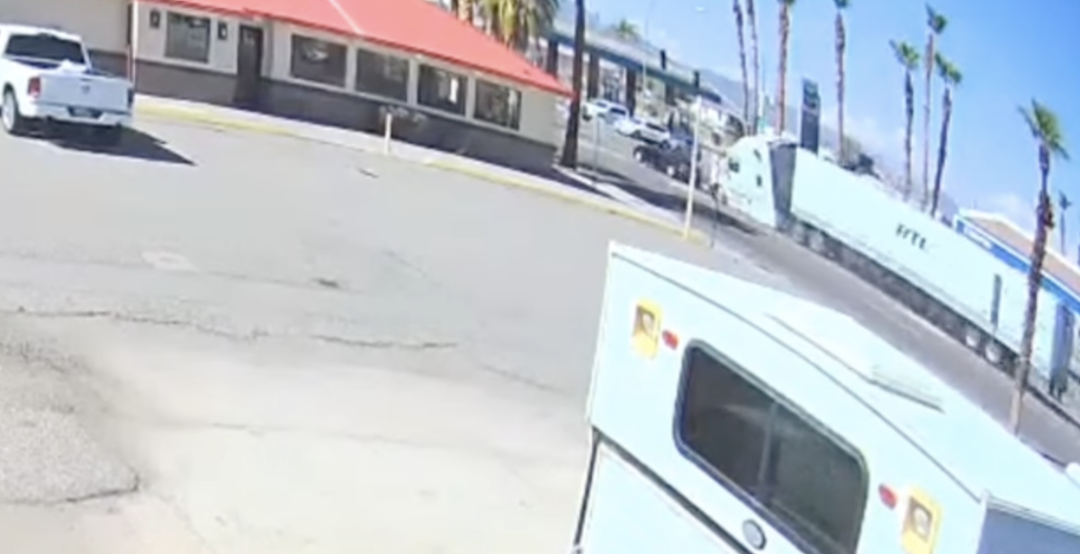 Semi truck’s intense crash through intersection filmed by local business 