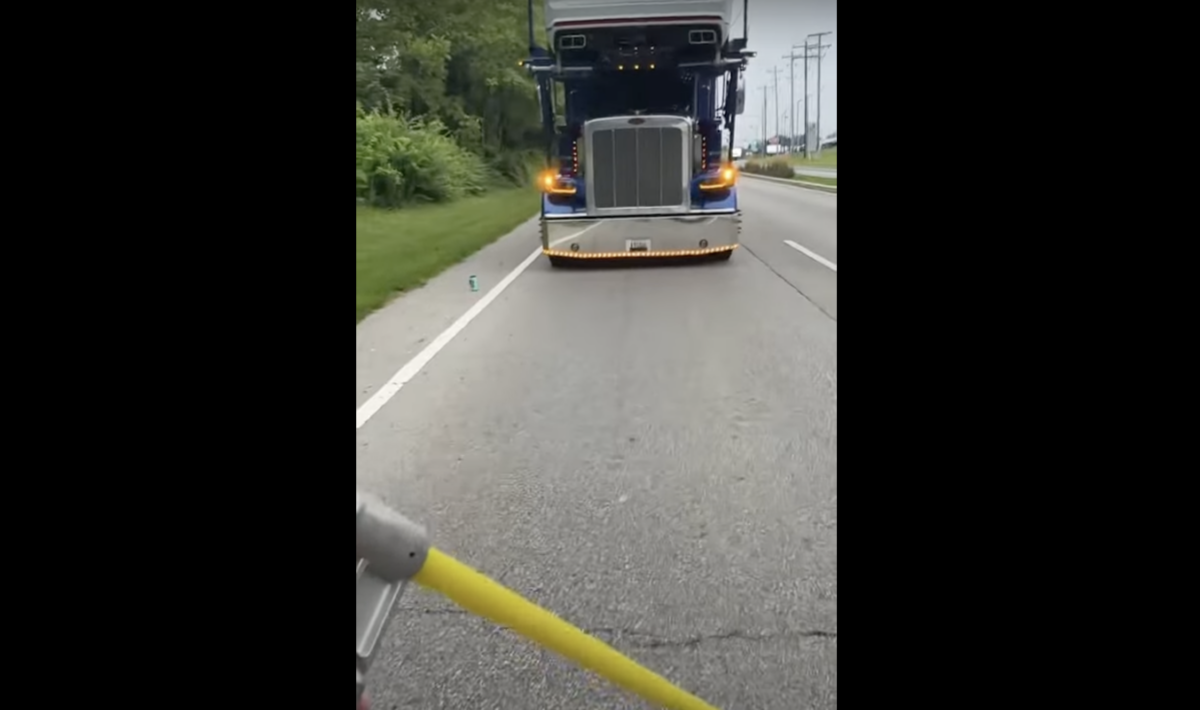 WATCH: Car hauler takes the time to measure bridge height himself 