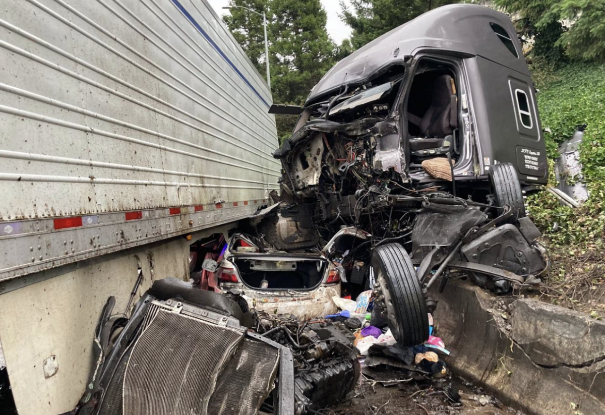 “Neither had critical injuries” after car ends up underneath twisted semi truck 