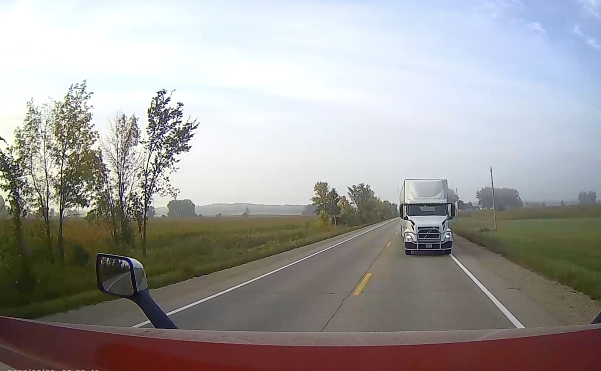 WATCH: Driver’s cross over center line totals both rigs 