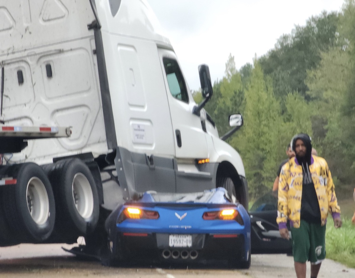 Everyone walked away from this wreck that squashed a Corvette beneath a semi truck 