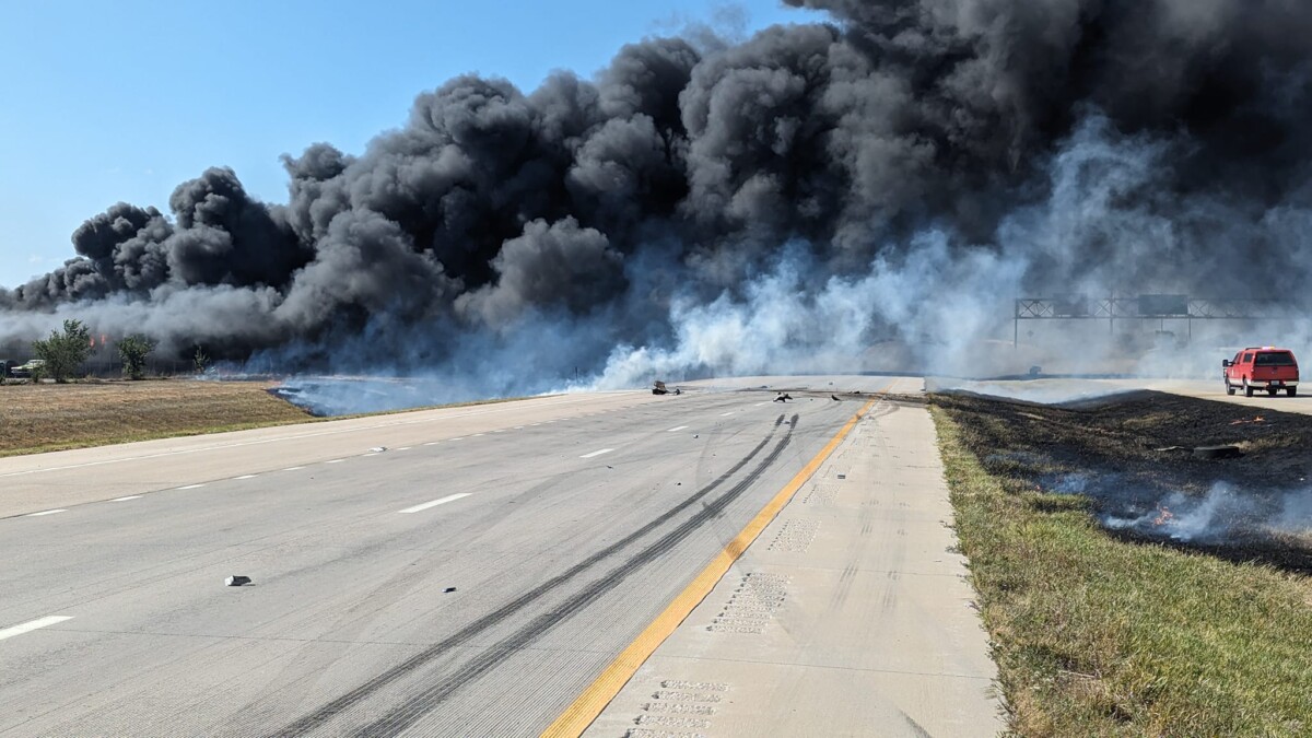 Semi truck-involved collision sparks huge building fire, closes Kansas highway