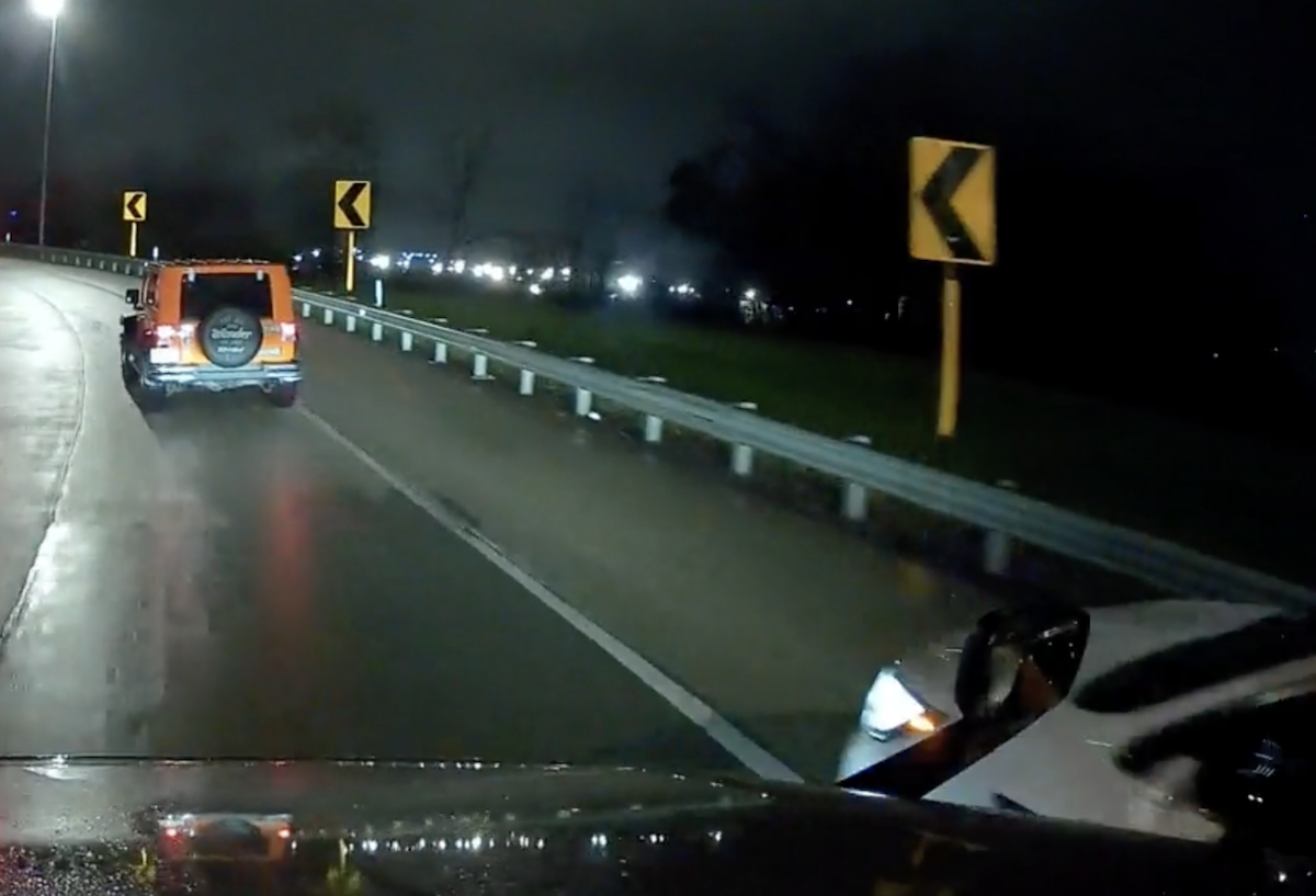 Car squeezes by semi truck in video that leaves trucker “at a loss for words”