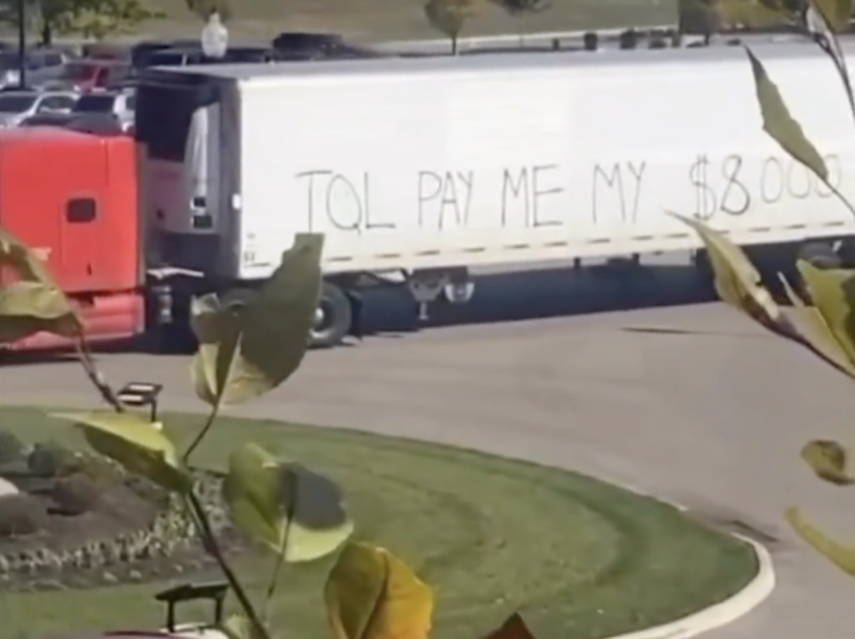 VIDEO: Trucker shows up at TQL headquarters with ‘Pay Me My $8000’ spray painted on trailer