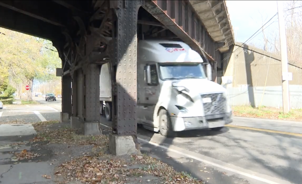 News station crew happens to catch video of a semi scraping under Tonawanda bridge