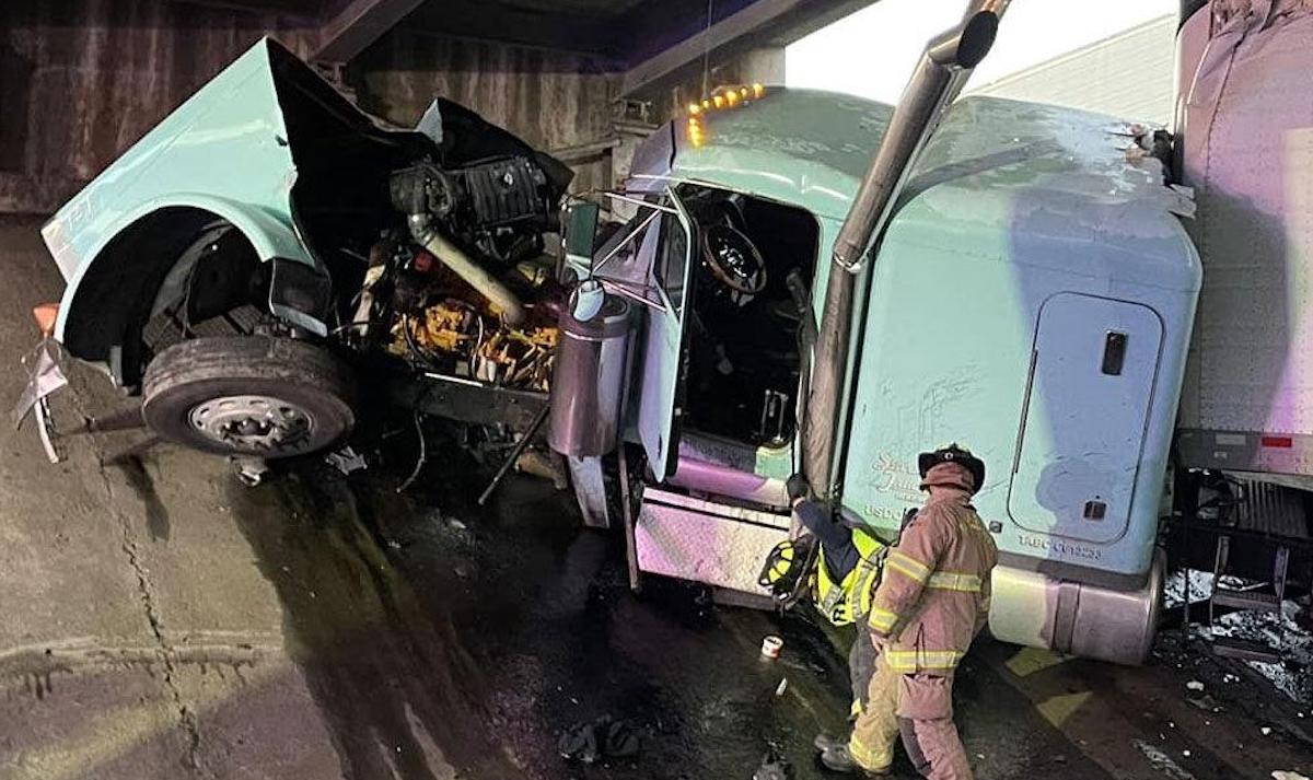 Truck driver walked away from crash into bridge with minor injuries