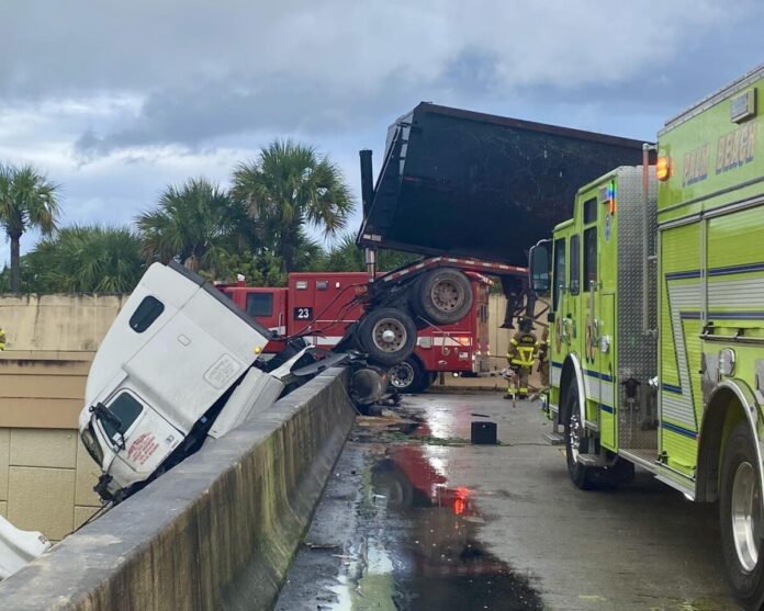 Video shows Florida firefighters rescuing a trucker from a big rig ...