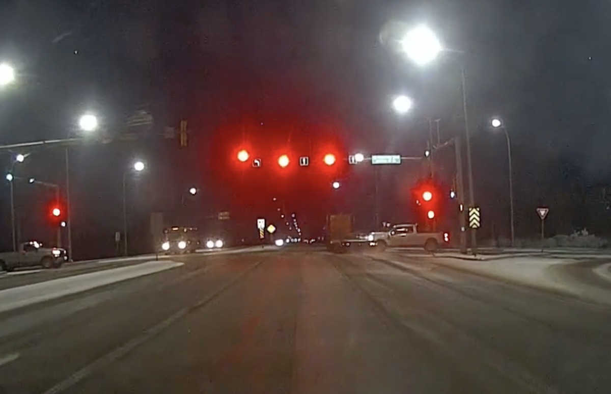 WATCH: Pickup truck drives straight into flatbed trailer that ran red light