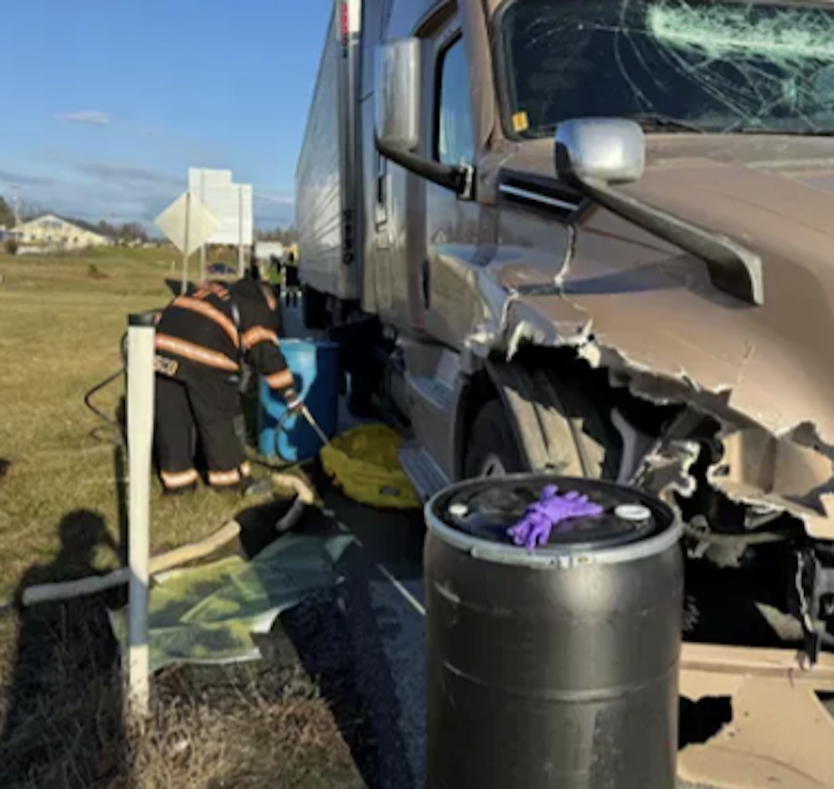 Trucker injured after dump truck debris smack into tractor trailer