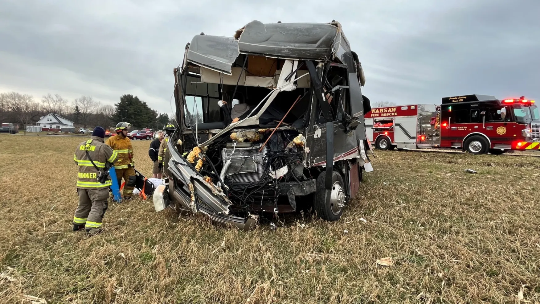 Police say trucker ran stop sign and collided with a motorhome in