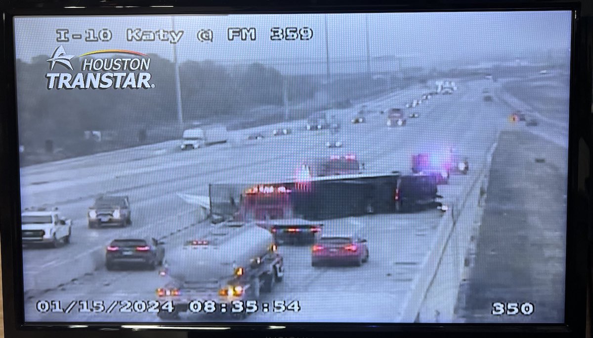 Overturned semi truck stumps first responders, commuters during winter weather in Houston